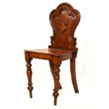 Victorian mahogany hall chair with raised shield decoration to the shaped back Condition: