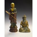 South East Asian gilt metal cast figure of a seated Buddha, with crossed legs, open left palm and
