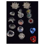Group of fifteen Swarovski ornaments to include; water lilies, flowerheads, hearts, shells,