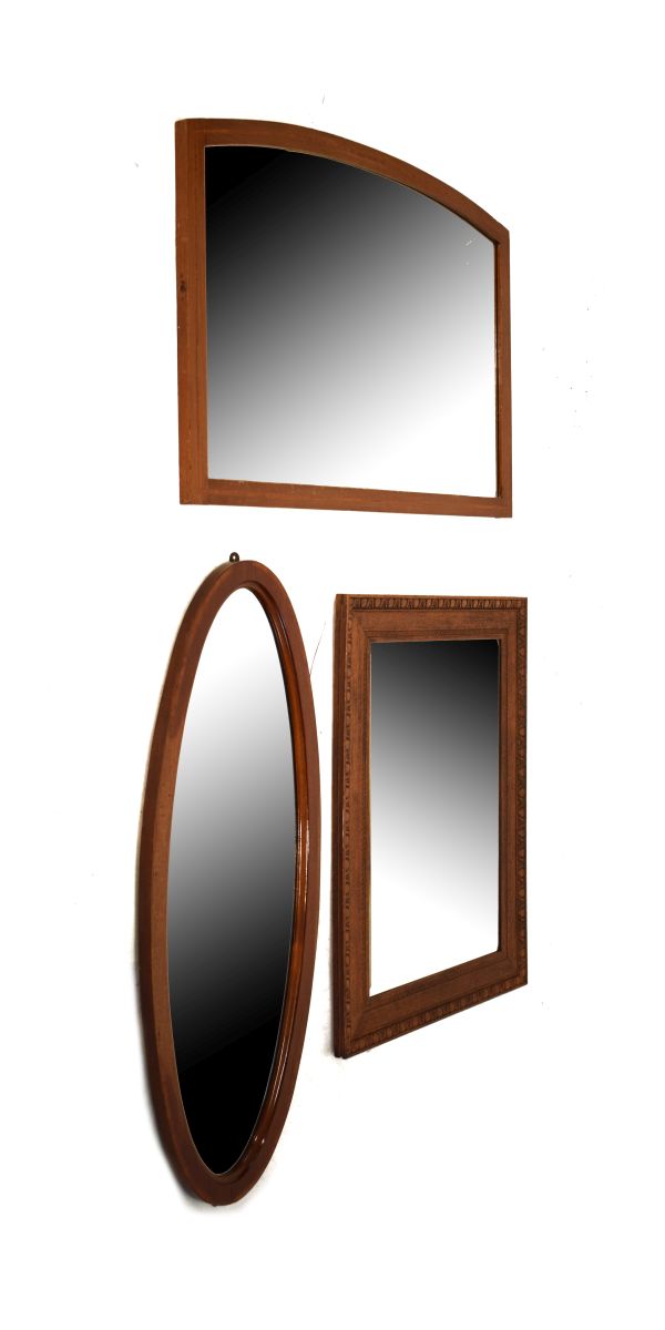 Three assorted early 20th Century wall mirrors Condition: