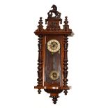 Late 19th/early 20th Century beech cased Vienna style wall clock, decorative pediment with rearing