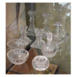 Group of Waterford crystal comprising: two pairs of candlesticks, pedestal scent bottle, another
