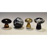 Four assorted glass paperweights comprising: a spherical example marked Phoenician Glass Malta,
