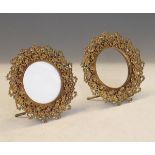 Small pair of vintage photograph frames, each of circular design, finely modelled in relief with
