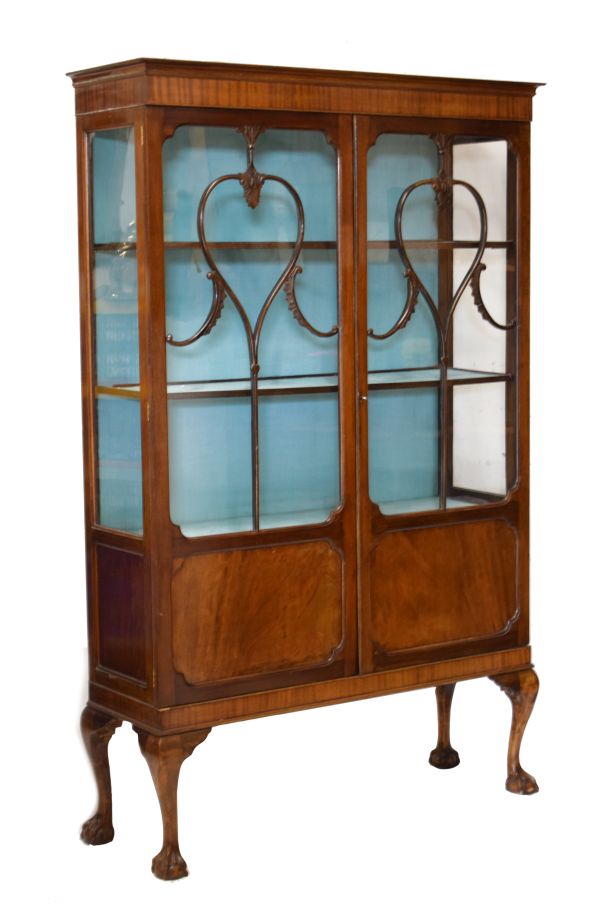 Early 20th Century mahogany and beech display cabinet fitted three shelves enclosed by a pair of