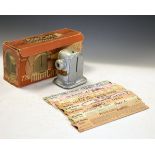 Vintage 'Mini Cine Movies and Stills' camera in original printed card box of issue, together with