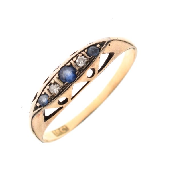 Dress ring set graduated diamonds and sapphire coloured stones, the shank stamped 18ct, size O, 2g