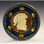 Early 20th Century Austrian majolica plate having central decoration in relief depicting a profile