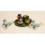 Early 20th Century novelty cruet set comprising: salt and pepper modelled as birds, mustard pot