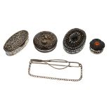 Four assorted silver and white metal patch/pill boxes comprising: two oval and two circular,