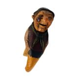 Early 20th Century painted treen nutcracker modelled as a comical gentleman with bowler hat