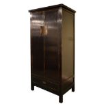 Oriental-style black lacquered oak or ash wardrobe with cleated doors enclosing hanging space over