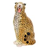 Large glazed pottery figure of a seated leopard or cheetah, possibly Italian, 62cm high Condition: