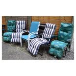 Group of garden furniture comprising: two pairs of folding sun loungers plus a single, and a pair of