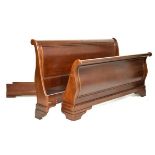 Modern king-size mahogany sleigh bed with wooden runners and slatted base, 190cm wide Condition: