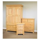 Modern oak double wardrobe fitted pair of panelled doors enclosing hanging space, over two short and