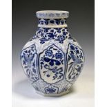 Chinese octagonal vase having blue and white decoration depicting phoenix and animals amongst