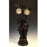 Reproduction bronze finish figural table lamp modelled as a courting couple standing beneath two