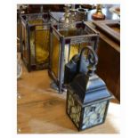 Pair of early 20th Century stained glass hall lanterns, together with a later lantern (3) Condition: