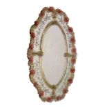 Early 20th Century Continental glass wall mirror, possibly Venetian, with oval main plate and