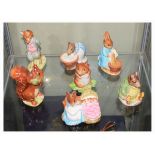 Seven Beswick Beatrix Potter figures - Foxy Whiskered Gentleman, Squirrel Nutkin, Hunca Munca, Timmy