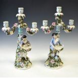 Pair of 19th Century Plaue-on-Havel figural three branch candelabra, each having allover floral