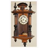 Early 20th Century Hamburg American Clock Co. spring-driven Vienna wall clock with crossed arrows to
