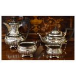 Silver plated four piece tea service, each piece having part fluted decoration and standing on