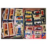 Two boxes of assorted die-cast and other boxed model vehicles to include; Lledo, Days Gone etc