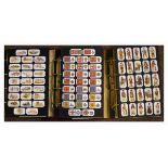 Three albums of Card Collectors Society reproduction cigarette cards in albums Condition: