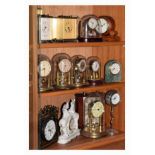 Assorted mantel clocks to include; carriage, anniversary/torsion and other examples (16) Condition: