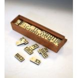 Set of early 20th Century bone and ebony double-9s dominoes Condition: