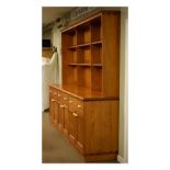 Large 20th Century high dresser, the upper stage having three banks of two shelves with fielded