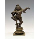 19th Century Indian bronze figure depicting Krishna as Balakrishna, dancing, his right leg raised, a