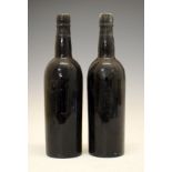 Wines & Spirits - Two bottles of Dow's 1960 Vintage Port (2) Condition: Some minor losses to the