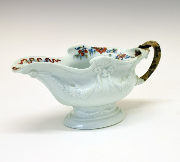 Mid 18th Century Lund's Bristol high footed sauce boat having typical moulded ribbon and swag