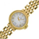 Dunhill - Lady's yellow metal wristwatch, the white dial with gilt Roman numerals and date window at