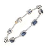 Sapphire and diamond 18ct white gold bracelet, the nine rectangular clusters with diamond set batons