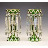 Pair of 19th Century white and gilt overlaid green glass lustre drop candlestick vases, probably
