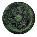 19th Century Continental green glazed majolica plaque decorated in relief with the Rape Of The