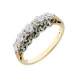 Five stone diamond 18ct gold ring, the graduated brilliant cuts totalling approximately 0.85 carats,