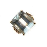 Aquamarine and diamond ring, stamped '585', the stepped cut stone measuring approximately 17.8mm x