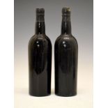 Wines & Spirits - Two bottles of Dow's 1960 Vintage Port (2) Condition: Some minor losses to the