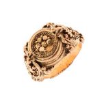 14ct yellow gold ring, probably Indian or Middle Eastern having decorative circular central panel