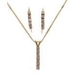 Diamond pendant on chain with matching earrings, the articulated line of six brilliant cuts