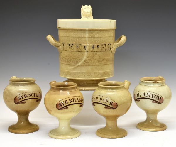 Three 19th Century apothecary's creamware syrup jars, each having a painted title cartouche, moulded