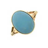 Single stone turquoise ring, stamped '18ct', size Q, 4.2g gross Condition: The oval cabochon