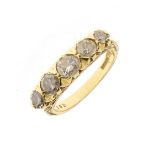 Five stone diamond 18ct gold ring, the graduated brilliant cuts totalling approximately 0.85