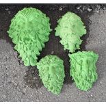 Four reconstituted 'Green Man' garden ornaments, each with green-stained finish (4) Condition: