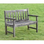 Weathered teak two-seater garden bench, 108cm wide Condition: